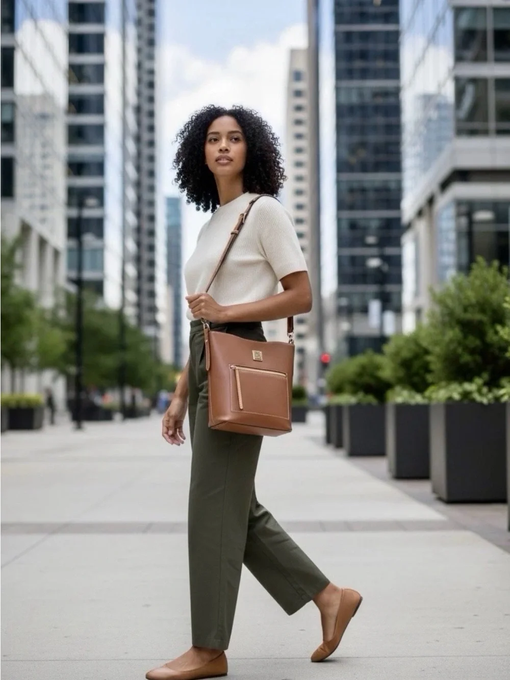 Dooney & Bourke Brown Saffiano Leather Crossbody Bag.
